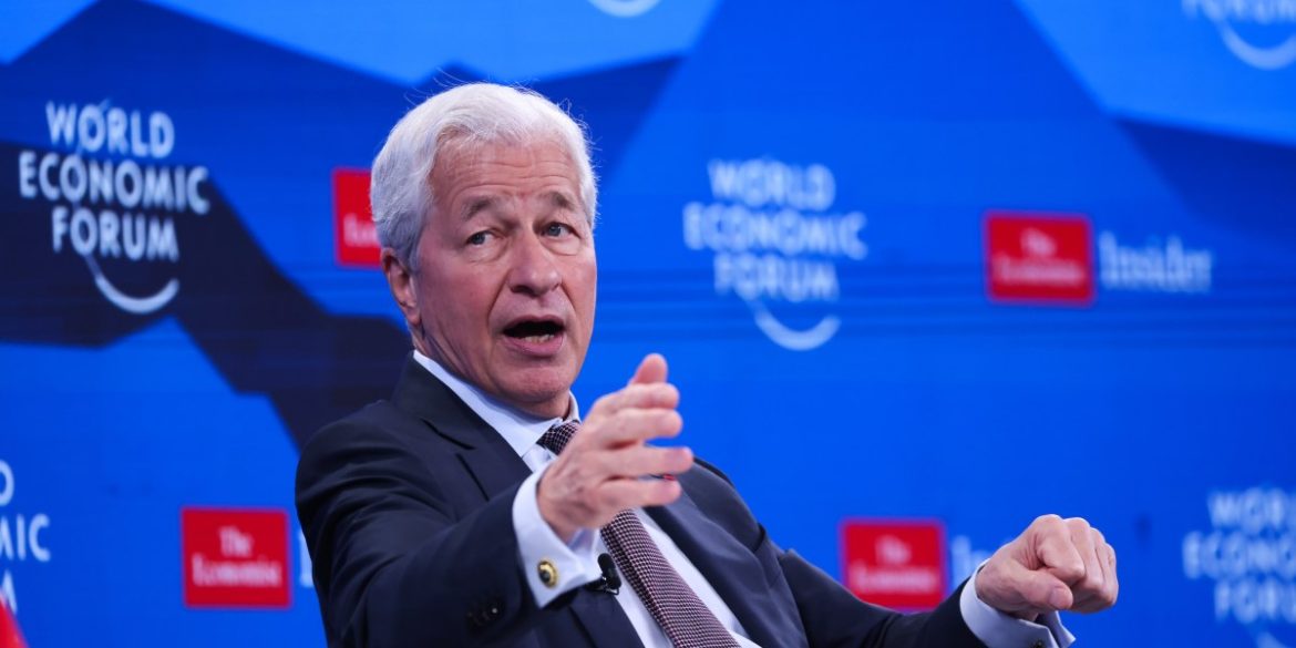 How leaders like Jamie Dimon and Microsoft president Brad Smith are trying to ease employee anxiety about AI